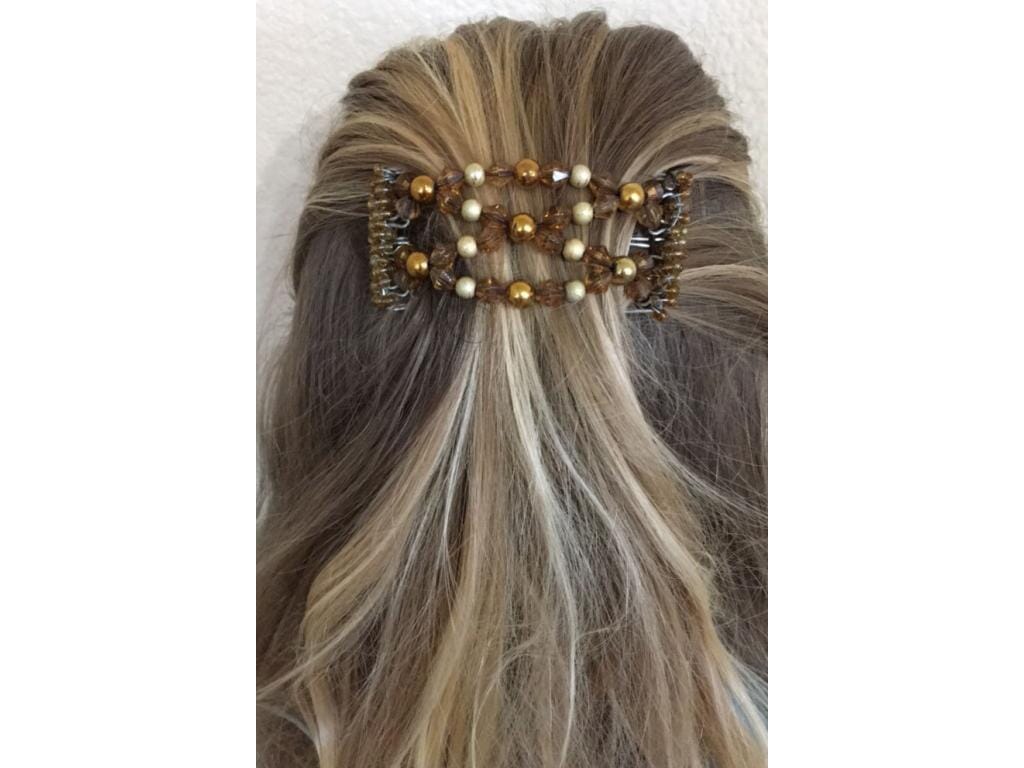 Young woman showcasing our African Butterfly 5 Tong Wire Hair Clip with a sides up hairstyle