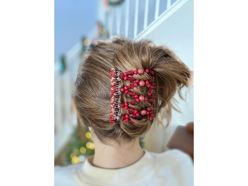 Young woman showcasing our 9 Tong Wire Hair Clips in a cascade hairstyle